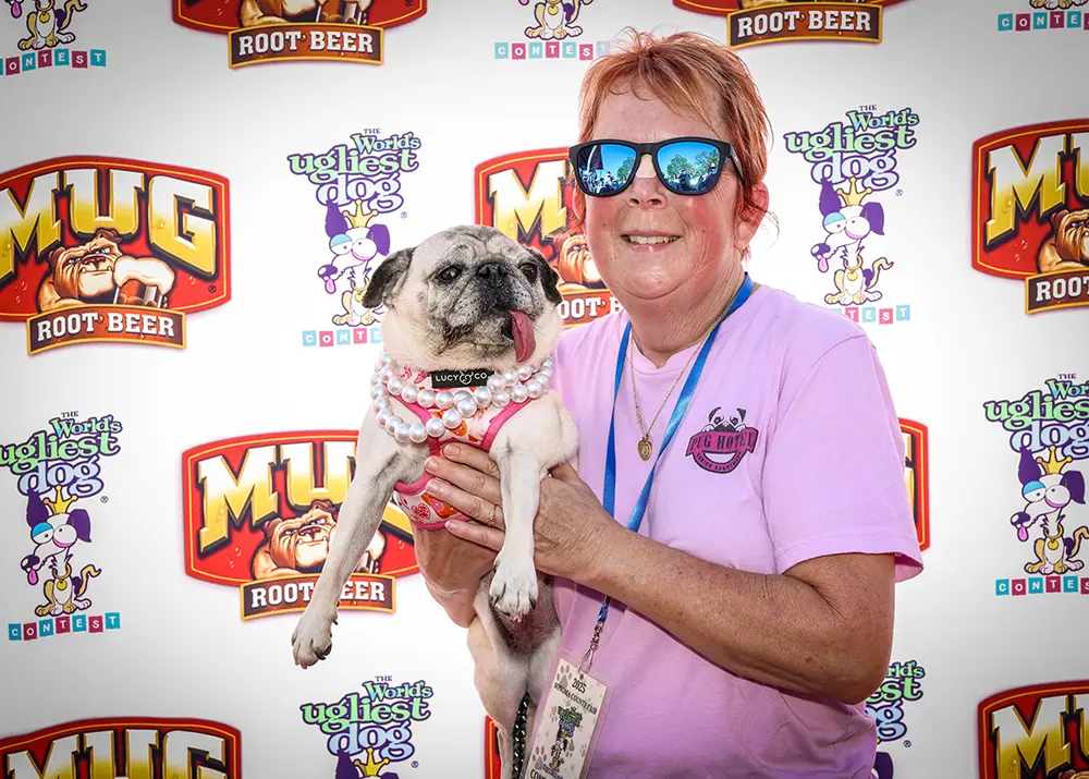 World's Ugliest Dog® 2025 second place and spirit award winner Jinny Lu and her owner